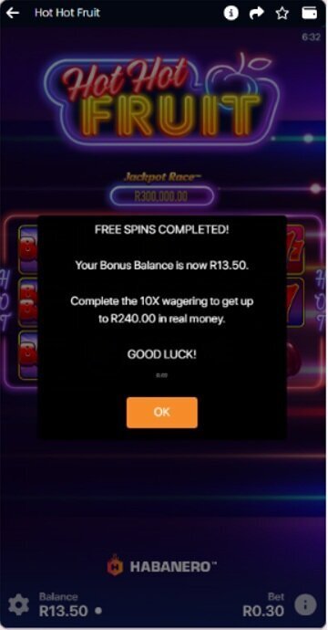 Lucky Fish Hot Hot Fruit popup showing R13.50 bonus balance after 50 spins and 10x wagering required on winnings